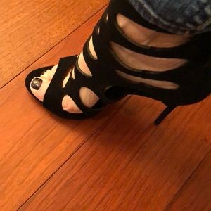 Like New Giuseppe Zanotti pair of open booties.